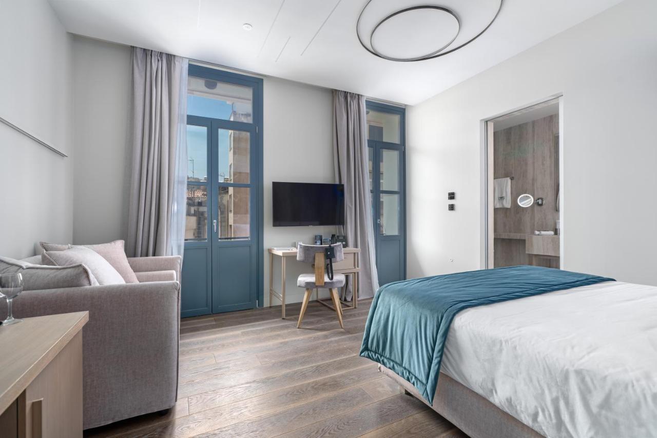 Hellenic Vibes Smart Hotel 雅典 外观 照片 A room at the hotel