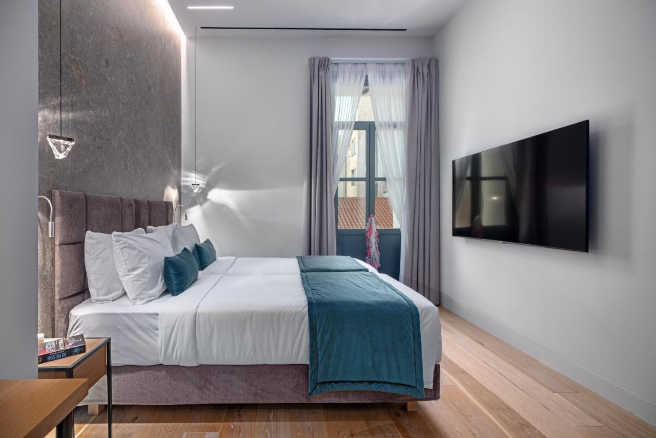 Hellenic Vibes Smart Hotel 雅典 外观 照片 A room at the hotel
