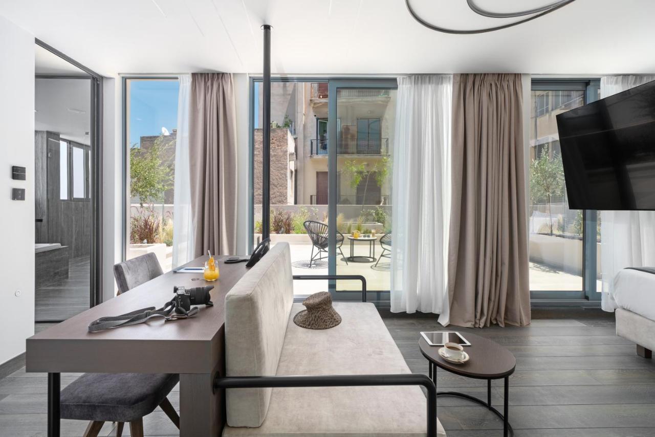 Hellenic Vibes Smart Hotel 雅典 外观 照片 The interior of a suite at the hotel