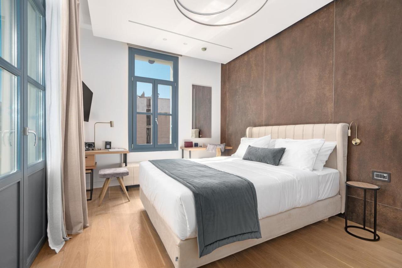 Hellenic Vibes Smart Hotel 雅典 外观 照片 A bedroom at the hotel