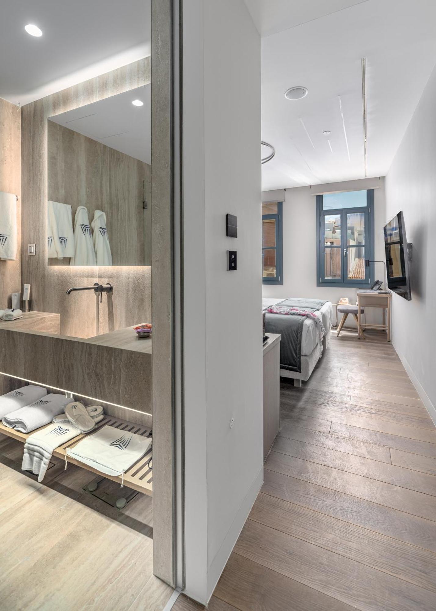 Hellenic Vibes Smart Hotel 雅典 外观 照片 A room at the hotel